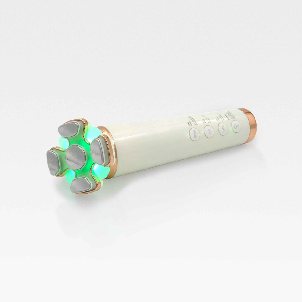 A sleek white and gold skincare device featuring a glowing green LED light, designed for skin tightening and contouring.