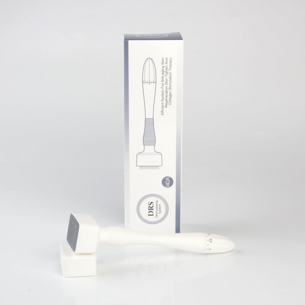 image of derma stamp microneedling tool with cover and box