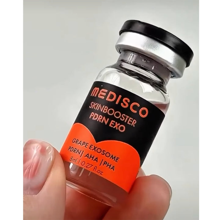 Close up to Medisco Skinbooster PDRN EXO vial held in a hand 