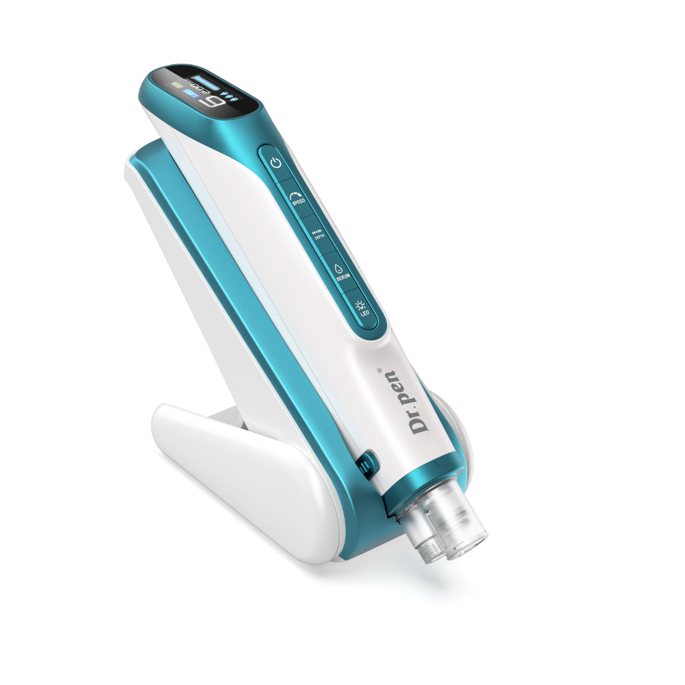 Blue and white Dr. Pen H6 wireless microneedling pen with serum infusion, light therapy, and LCD display on charging dock.